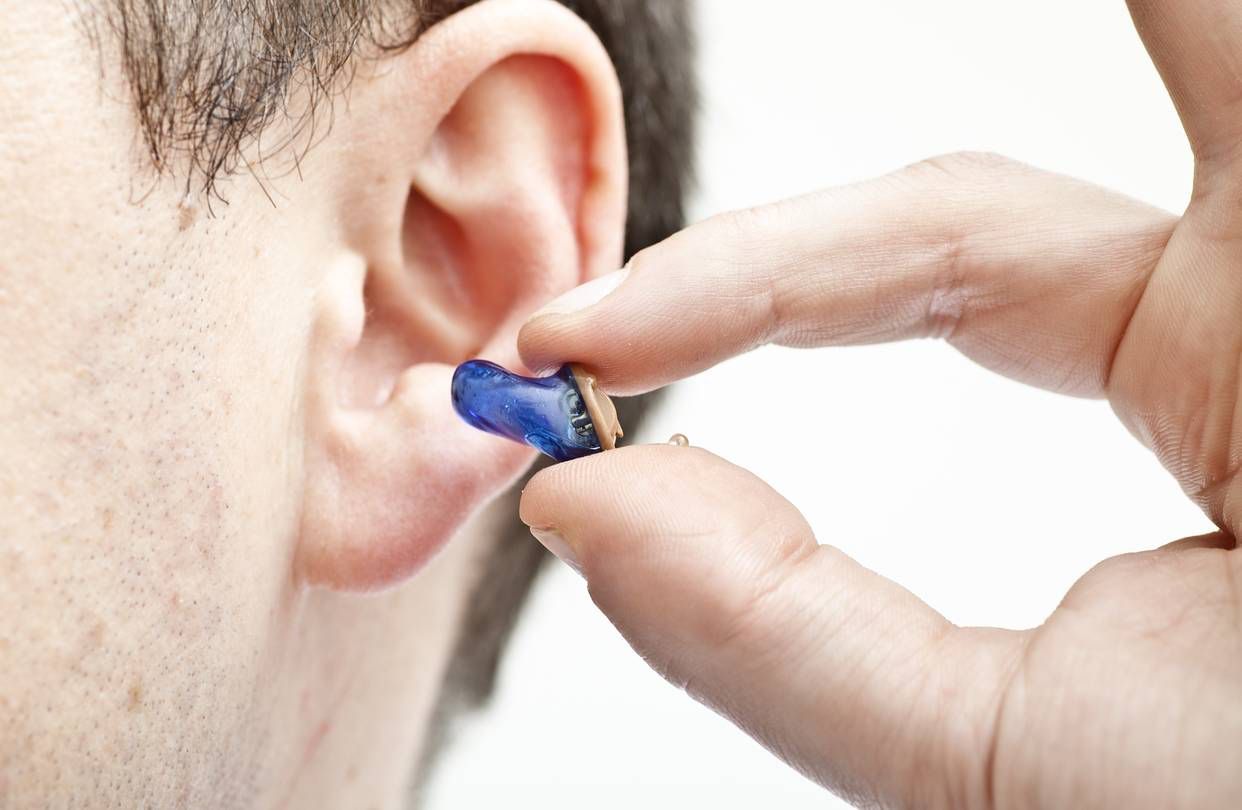 Audiologist with Patient